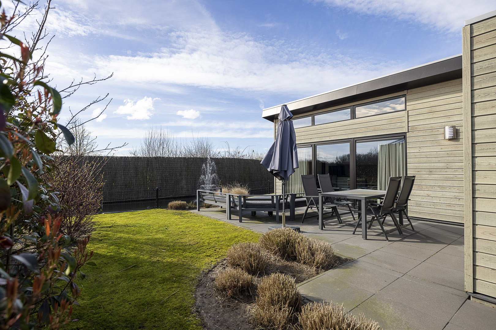 Watervilla op park Familiehuis Nunspeet aan een vijver in Nunspeet - Max. 6 personen